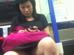 Voyeur Upskirt of Mature Japanese on Commuter Train