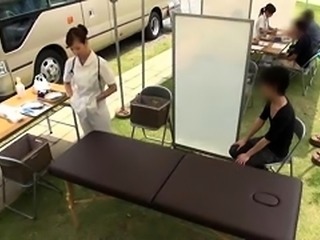 Naughty Asian nurse in uniform gets fucked in the outdoors