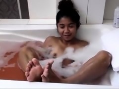 Exotic camgirl with perfect boobs masturbates in the bathtub