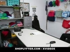 Muslim Shoplifter (Delilah Day) Caught Piling Expensive Merch Under Her Hijab