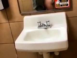 Slutty amateur teen fucked and facialized in a public toilet