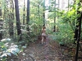 chubby girl with big booty walking nude in forest