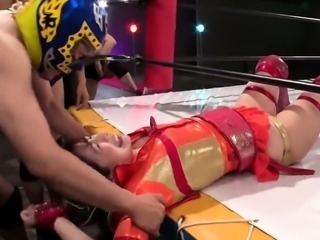 Japanese wrestler in costume sucks and fucks a gang of cocks