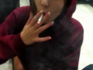 Young smoker sucks a big dick and takes it deep doggystyle