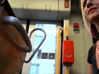 Girl jerks a lucky guy cock on the bus