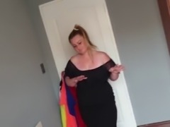 Fat girl playing dress up by trying on different dresses