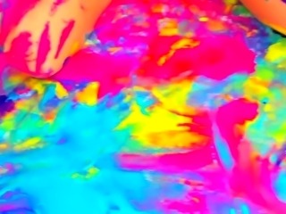 Naked teen dancing and covering her sexy body in paint