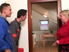 Two men have fun with busty blonde grandmother