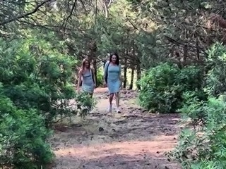 Big boobed lesbian cougar preys on teen pussy outdoors