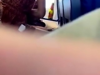 Amateur babe caught blowing boyfriend's cock in public
