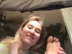 Blonde worships her own toes
