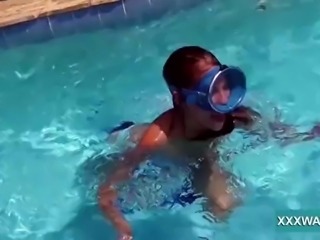 Hot brunette slut Candy swims underwater