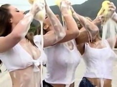 Wet and wild outdoor car wash with three stacked milfs