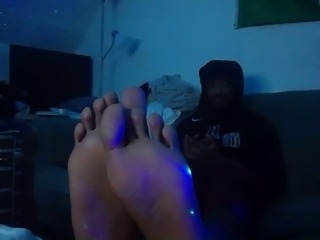 Student athlete teases her soles in your face