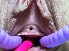 Close up toying tight shaved pussy to the point of orgasm