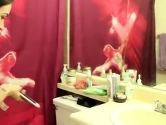 Naughty teen with shaved pussy peeing in the bathroom sink