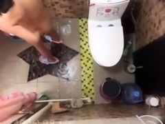 Hidden camera captures lustful Asian teen masturbating