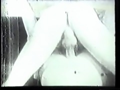 Vintage clip of southern belle with big tits sucking husband's big cock on sofa