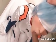 Asian babe mouth and cunt fucked in cosplay scene