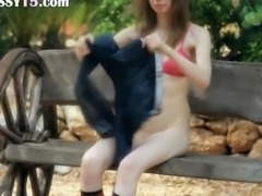 Ultra skinny girl masturbate on a bench