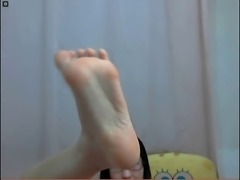 Chinese girl shows foot for webcam