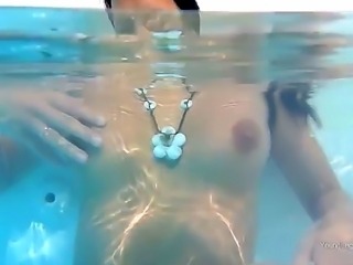 Super sexy and beautiful Lily masturbates her narrow and sweet pussy under the water