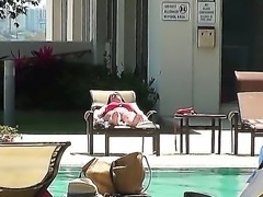 Melina Mason was sunbathing by the pool when she caught an eye of a stranger....