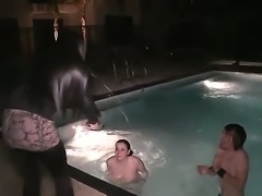 Kinky teeners splash in the pool, biting and pinching each others nipples