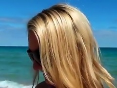 Sexy beach-boy meets two blonde milf tanning at the beach. They have...