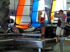 Sexy sensational blonde babe in nice high heels shows off her nice ass in race show