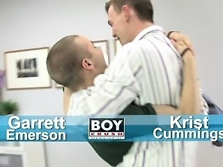 Garrett whisks Krist off his feet to carry him to the bed