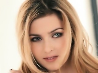 sweet blonde on the black sofa