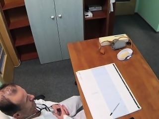 Slim brunette takes doctors dick in an office