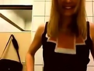 Blonde Teasing In A Public Washroom