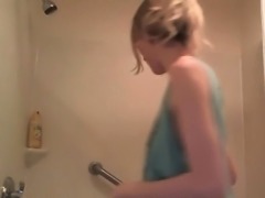 Amazing teen blonde masturbates on the shower