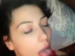 Pretty brunette teen eating a black dick POV