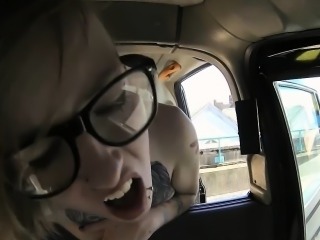 Tattooed blonde passenger in glasses gets banged outdoor