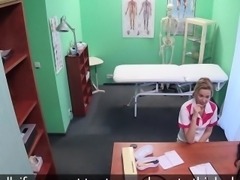Angry doctor gives nurse facial