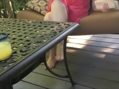 Sexy mother in law with bare feet and painted toes