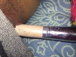 Masturbating tease with makeup brush
