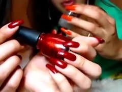 2 girls play with long natural nails