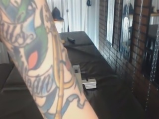 Red haired tattooed titless bitch was riding dildo on top on webcam