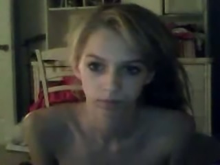 Blonde teen with flat tits spreads her legs wide apart masturbating on cam