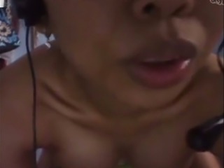 Horny Indonesian MILF pretends sucking a nice dick on Skype
