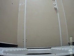 White booty of an amateur lady in the toilet room on hidden cam video