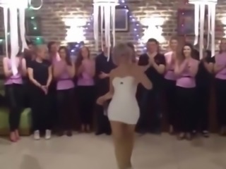 A porn party: sexy blonde in very sexy tight sexy dress dancing
