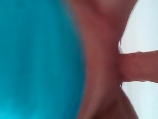 Riding a dildo