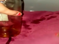 Heather fucking a bottle to squirt
