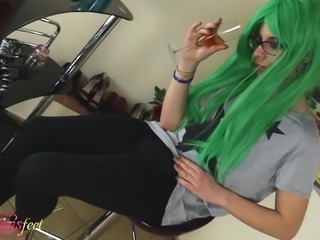 Tranny Irene Aoki wearing a green wig and teasing with her feet