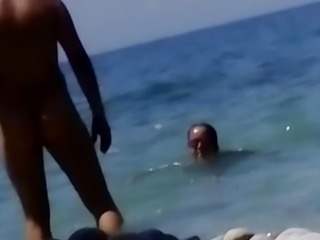 Naked on non-nudist beach